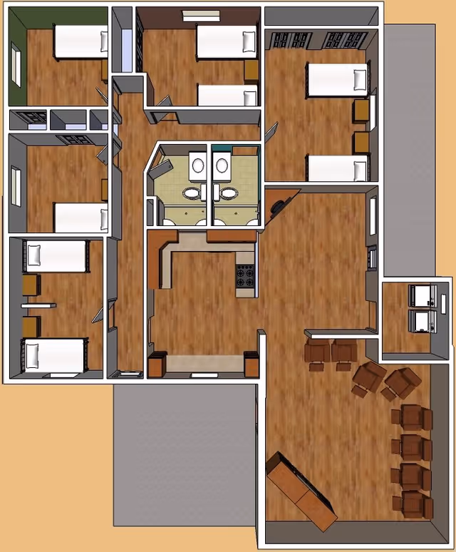 Top-down floor plan of a senior living facility showing multiple bedrooms with beds and nightstands, two bathrooms with sinks and toilets, a kitchen area with stove and counters, a living room with chairs and a TV, and a laundry area with washer and dryer.
