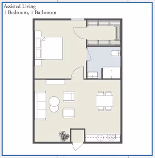 Floor plan of an assisted living unit with 1 bedroom and 1 bathroom. The layout includes a bedroom with a bed, a bathroom with a toilet and sink, a living area with seating and a coffee table, a dining area with a table and chairs, and a kitchen area with appliances. There is an entry door at the bottom center and closets near the bathroom.