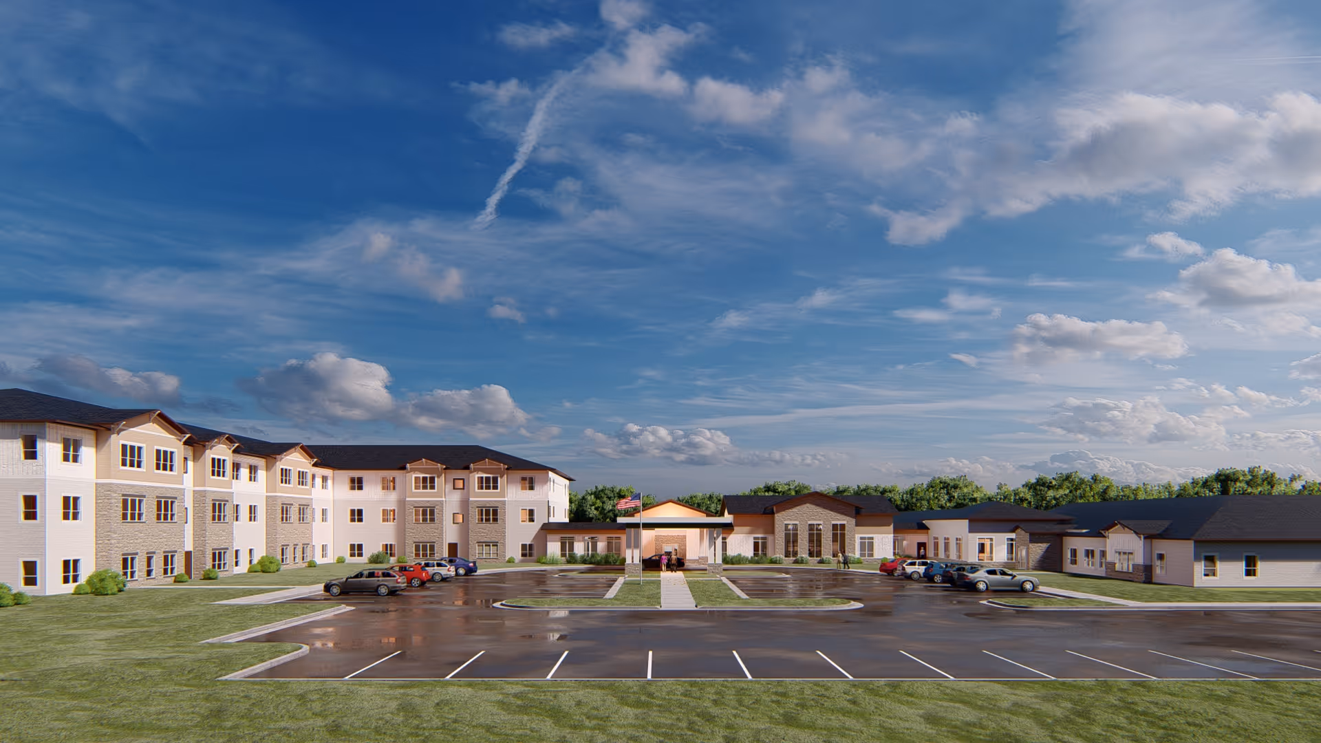 Front exterior of Harmony Gardens Senior Living showing the building entrance, parking lot, lawns, and a blue sky.