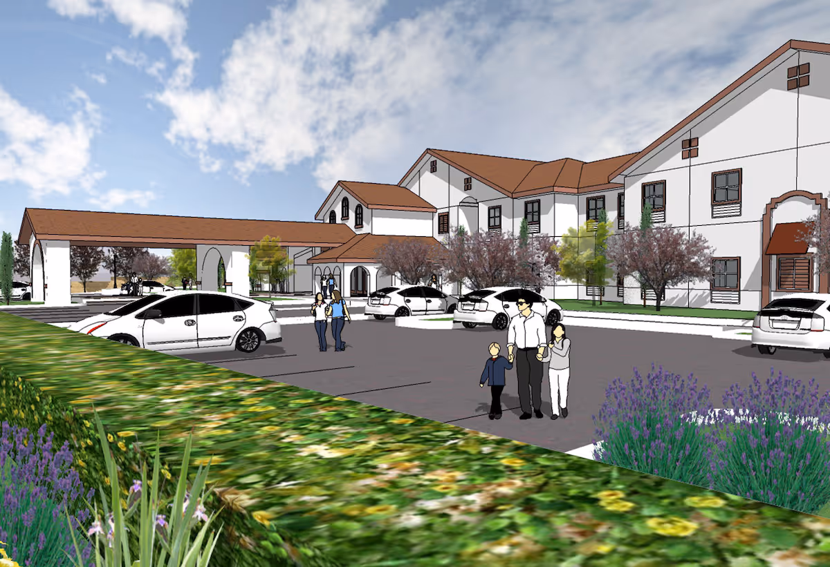 Architectural rendering of a two-story senior living building with a covered drop-off, parking lot, landscaped foreground and illustrated people walking nearby.