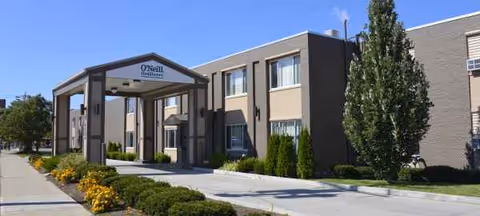 Exterior view of O'Neill Healthcare Lakewood with a covered entrance and landscaped walkway.