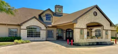 Brookdale Northshore senior living facility exterior with stone facade and entrance.