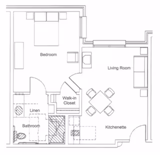 Architectural floor plan of a senior living unit at Kruse Village showing a bedroom with a bed and side tables, a walk-in closet, a bathroom with a toilet and shower, a linen closet, a living room with a sofa and chairs, and a kitchenette with a dining table and four chairs.