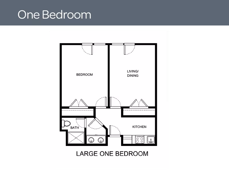 Floor plan of a large one-bedroom apartment showing a bedroom, living/dining area, kitchen, and bathroom with labeled rooms and door placements.