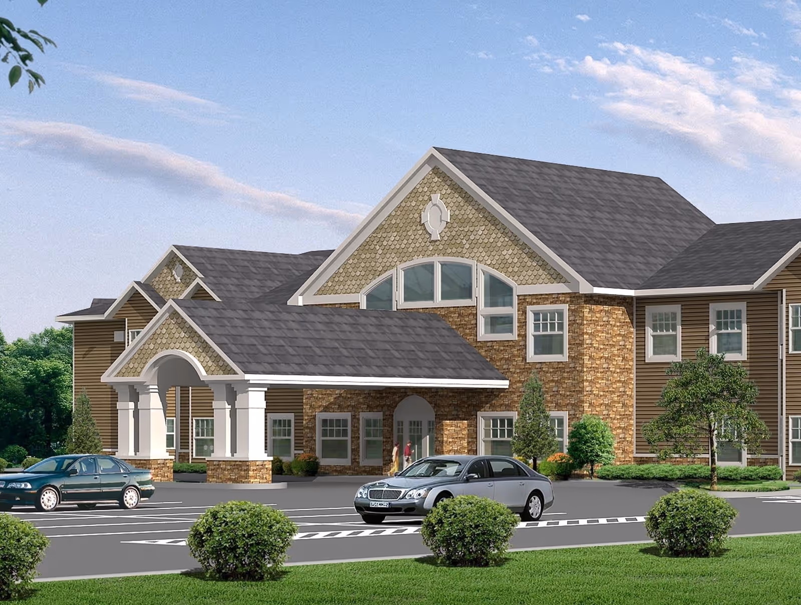 Exterior view of a senior living facility building with a covered entrance, multiple windows, and a stone and siding facade. There are two cars parked in front and some small bushes and trees in the landscaped area.