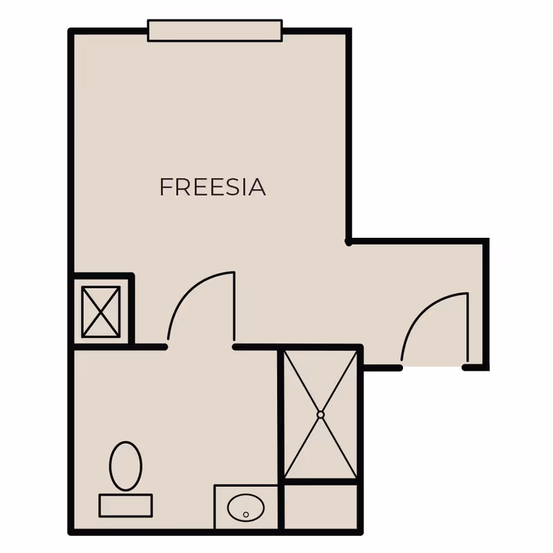 Floor plan layout labeled Freesia showing a room with a bathroom area including a toilet, sink, and shower.