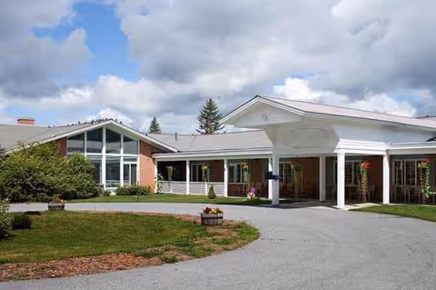 Exterior view of Lafayette Center facility with covered entrance and circular driveway