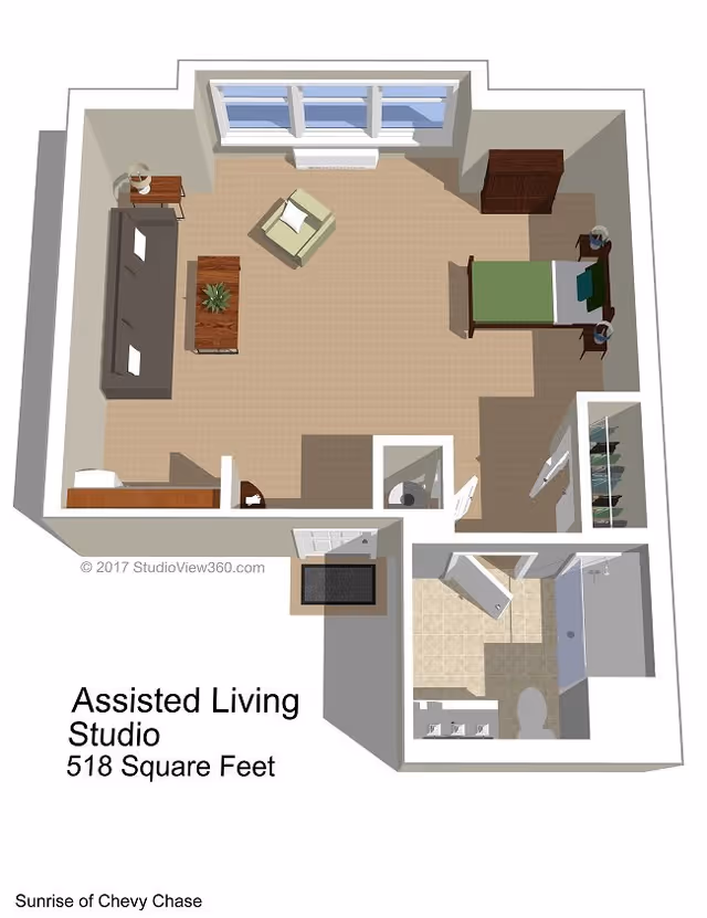 3D floor plan of an assisted living studio apartment measuring 518 square feet, featuring a combined living and sleeping area with a bed, armchair, sofa, coffee table, and dresser. The apartment includes a bathroom with a shower, toilet, and double sink, as well as a closet near the entrance. Large windows are shown on one wall of the living area.