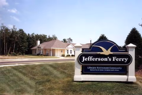 Jefferson's Ferry Lifecare Retirement sign in front of a beige building on grass.