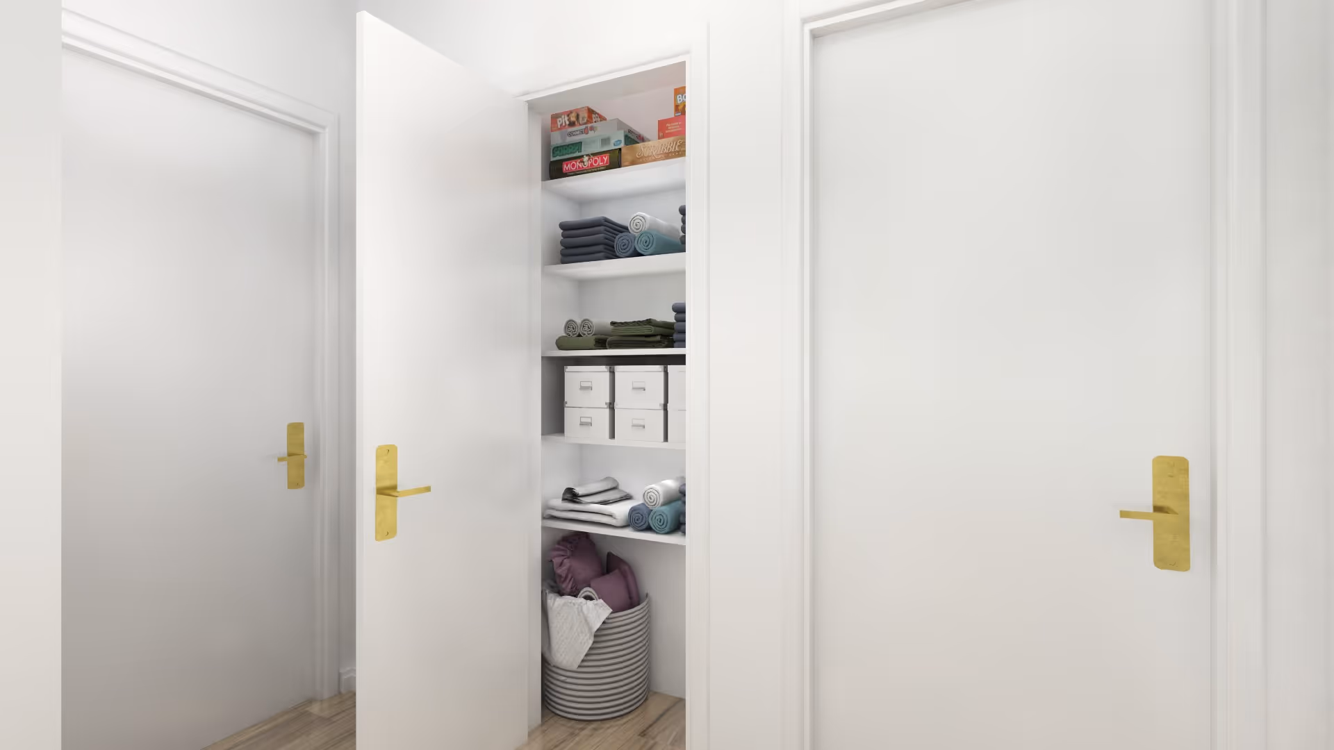 A hallway with white doors and an open linen closet holding folded towels, storage boxes, a wicker basket and board games.