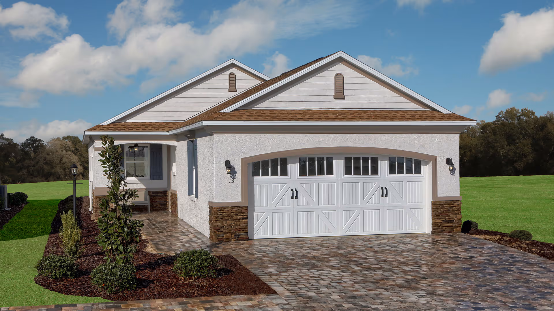 A single-story building with a two-car garage and landscaped front yard.