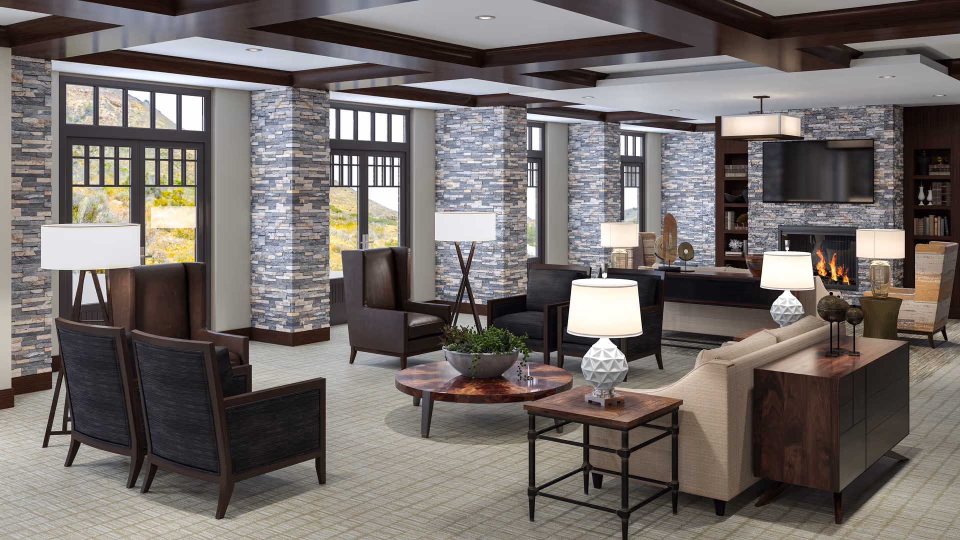 A spacious and modern living room with large windows allowing natural light to fill the space. The room features multiple seating areas with dark wood and leather chairs, a beige sofa, several table lamps, a round wooden coffee table with a plant centerpiece, and a fireplace with a mounted flat-screen TV above it. Stone accent walls and wooden ceiling beams add texture and warmth to the room.