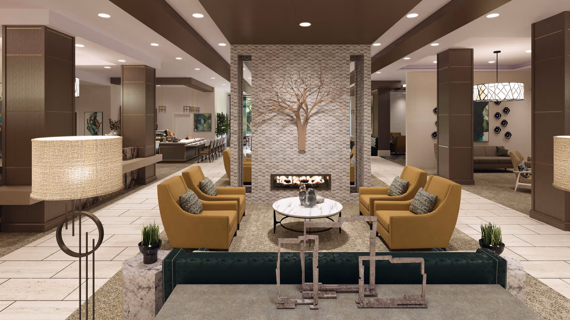 A modern and spacious living room area in The Seneca Rockville facility featuring four mustard yellow armchairs arranged around a round marble coffee table with decorative items. Behind the seating area is a stylish fireplace set in a textured wall with a tree sculpture above it. The room is well-lit with recessed ceiling lights and floor lamps, and there are additional seating and dining areas visible in the background.