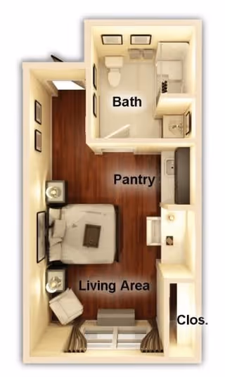 Top-down view of a small apartment floor plan showing a living area with a bed, chair, and TV, a pantry/kitchenette area, a bathroom with a toilet, sink, and shower, and a closet near the entrance.