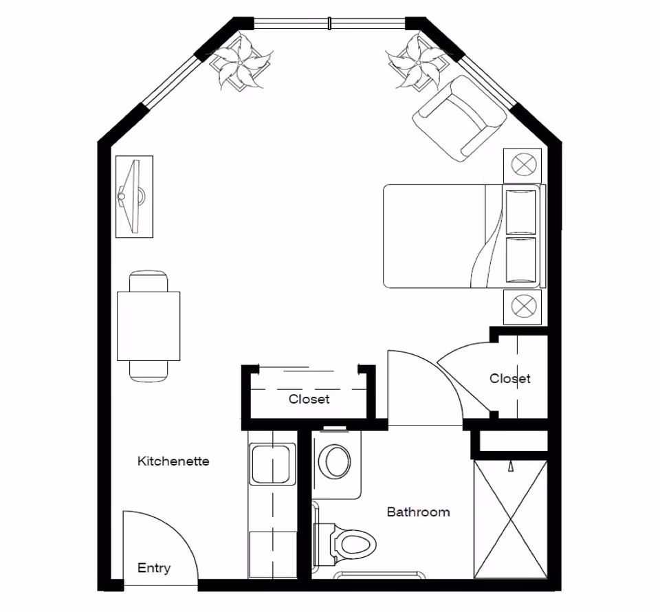 Floor plan of a studio apartment at Middlefield Oaks Assisted Living and Memory Care, featuring an entry leading to a kitchenette, a living and sleeping area with a bed, armchair, TV, and table, two closets, and a bathroom with a toilet, sink, and shower.