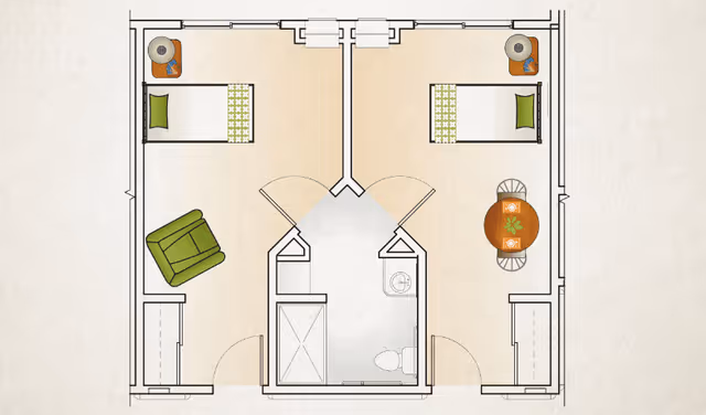 Floor plan of a two-bedroom unit with a shared bathroom in the center. Each bedroom contains a bed, a side table with a lamp, and a closet. The left bedroom has a green armchair, while the right bedroom has a round table with two chairs and a plant on it. The bathroom includes a shower, toilet, and sink.