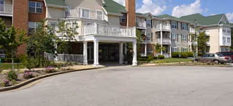 Exterior view of Elison Assisted Living of Oxford, front entrance of a multi-story building.