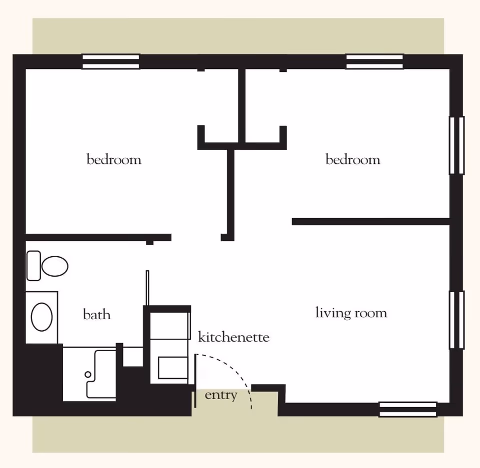 Floor plan of a living space showing two bedrooms, a bath, a kitchenette, an entry, and a living room.