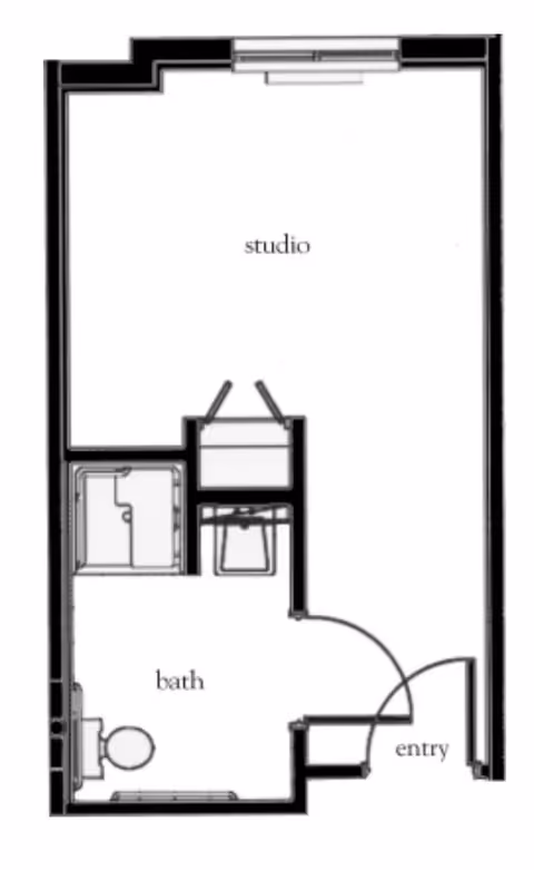 Floor plan of a studio apartment at Atria Park of St. Josephs showing an entry area, a combined studio living space, and a separate bathroom with a toilet and shower.