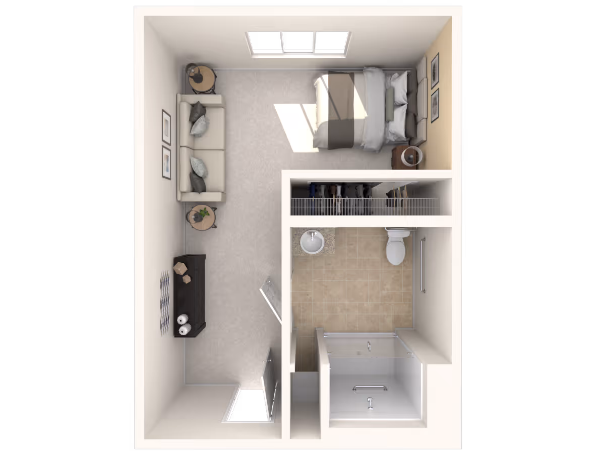 Top-down view of a senior living studio apartment floor plan featuring a combined living and sleeping area with a bed, sofa, side tables, and a dresser. The apartment includes a bathroom with a toilet, sink, and shower, and a closet space adjacent to the bathroom.