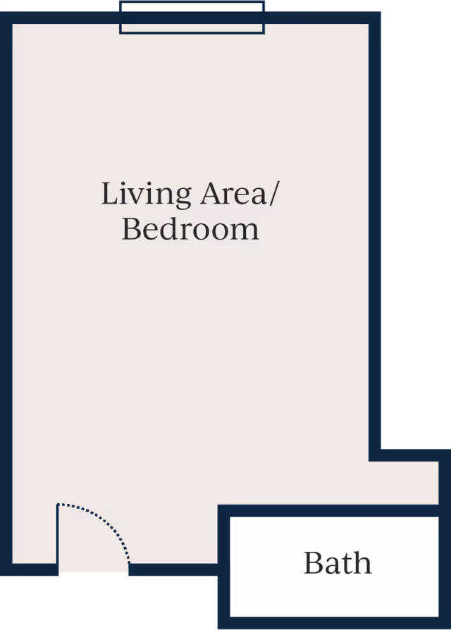 Floor plan showing a living area/bedroom connected to a separate bath room. The living area/bedroom is a larger rectangular space with an entrance door, and the bath is a smaller rectangular room attached to it.