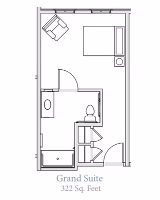 Floor plan layout of a Grand Suite at Grand Brook Memory Care of Fishers, showing a 322 square feet space with a bedroom area including a bed and chair, and a bathroom with a toilet, sink, and bathtub.