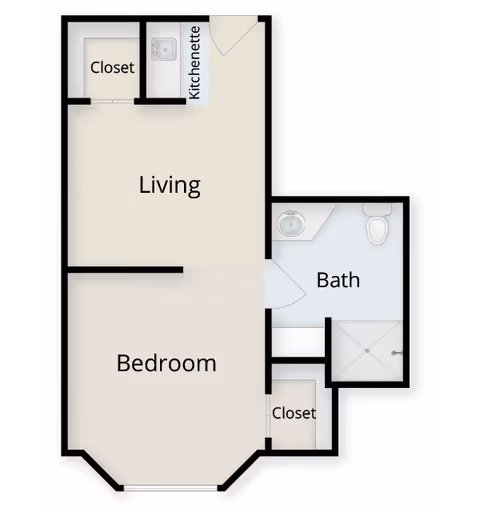 Floor plan layout of a senior living unit at Charter Senior Living of Hermitage showing a bedroom, living area with kitchenette, bathroom, and two closets.