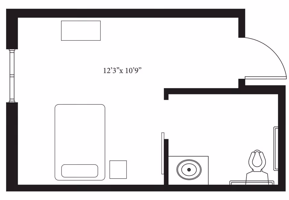 Architectural floor plan of a small room measuring 12 feet 3 inches by 10 feet 9 inches, featuring a bed, a small table, and an attached bathroom with a sink and toilet.