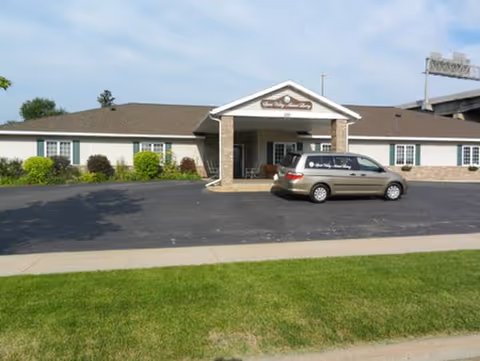Exterior view of VitaCare Living of Spirit Valley with a car parked in front