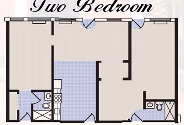 Floor plan layout of a two-bedroom apartment showing rooms including two bedrooms, two bathrooms, a kitchen area, and living spaces with doors and windows marked.