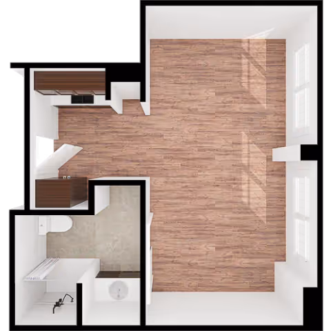 Top-down floor plan of a studio layout with a large wood-floored main room, kitchenette, bathroom, and entry.