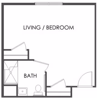 Floor plan of a small living space labeled as Living/Bedroom with an attached Bath that includes a shower, sink, and toilet.