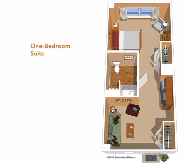 3D floor plan of a one-bedroom suite showing a bedroom with a bed, nightstand, and armchair; a bathroom with a toilet and shower; and a living room with a sofa, armchair, coffee table, and TV cabinet.