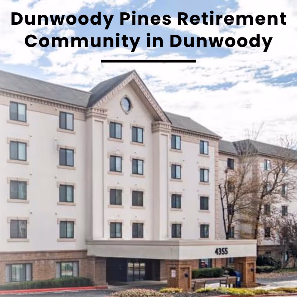 Exterior view of a multi-story retirement community building with several windows, a peaked roof section with a circular window, and the address number 4355 displayed on the entrance canopy. Trees and landscaping are visible around the building under a partly cloudy sky.