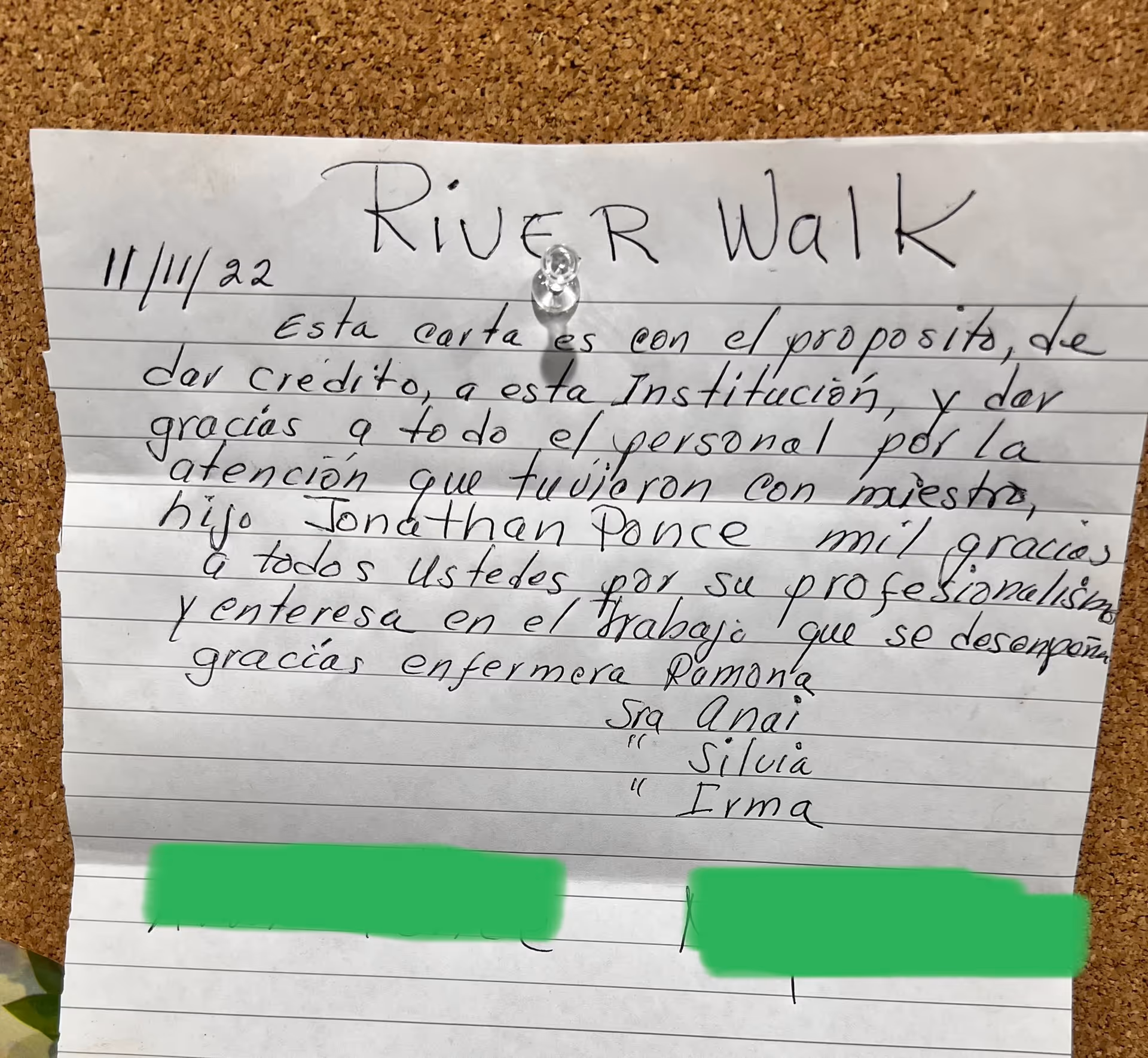 Handwritten Spanish note titled "River Walk" pinned to a cork bulletin board.