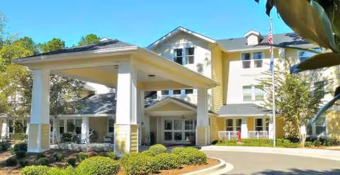 Front view of Ashley Park by Barclay House entrance with covered porte-cochere.