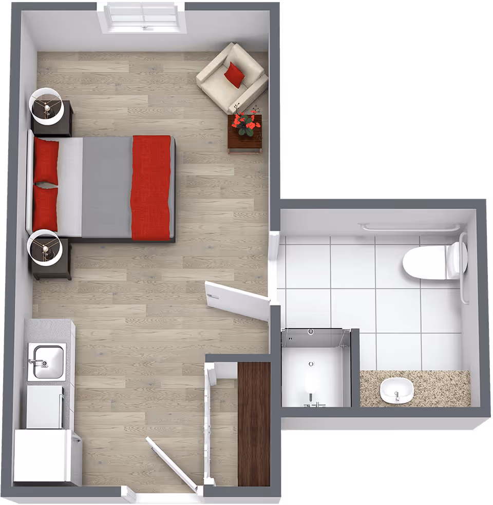 Top-down view of a small apartment layout featuring a bedroom area with a bed, two nightstands with lamps, a chair with a red pillow, and a small table with flowers. The apartment also includes a kitchenette with a sink, refrigerator, and stove, and a bathroom with a toilet, sink, and shower.