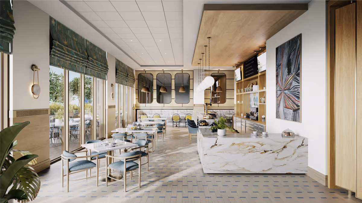 Bright and modern dining area with multiple tables and chairs arranged neatly. Large windows with green roman shades allow natural light to fill the room. A marble counter with pendant lights hangs from the ceiling, and there is a colorful abstract painting on the wall. Outside, a patio with additional seating is visible through the windows.