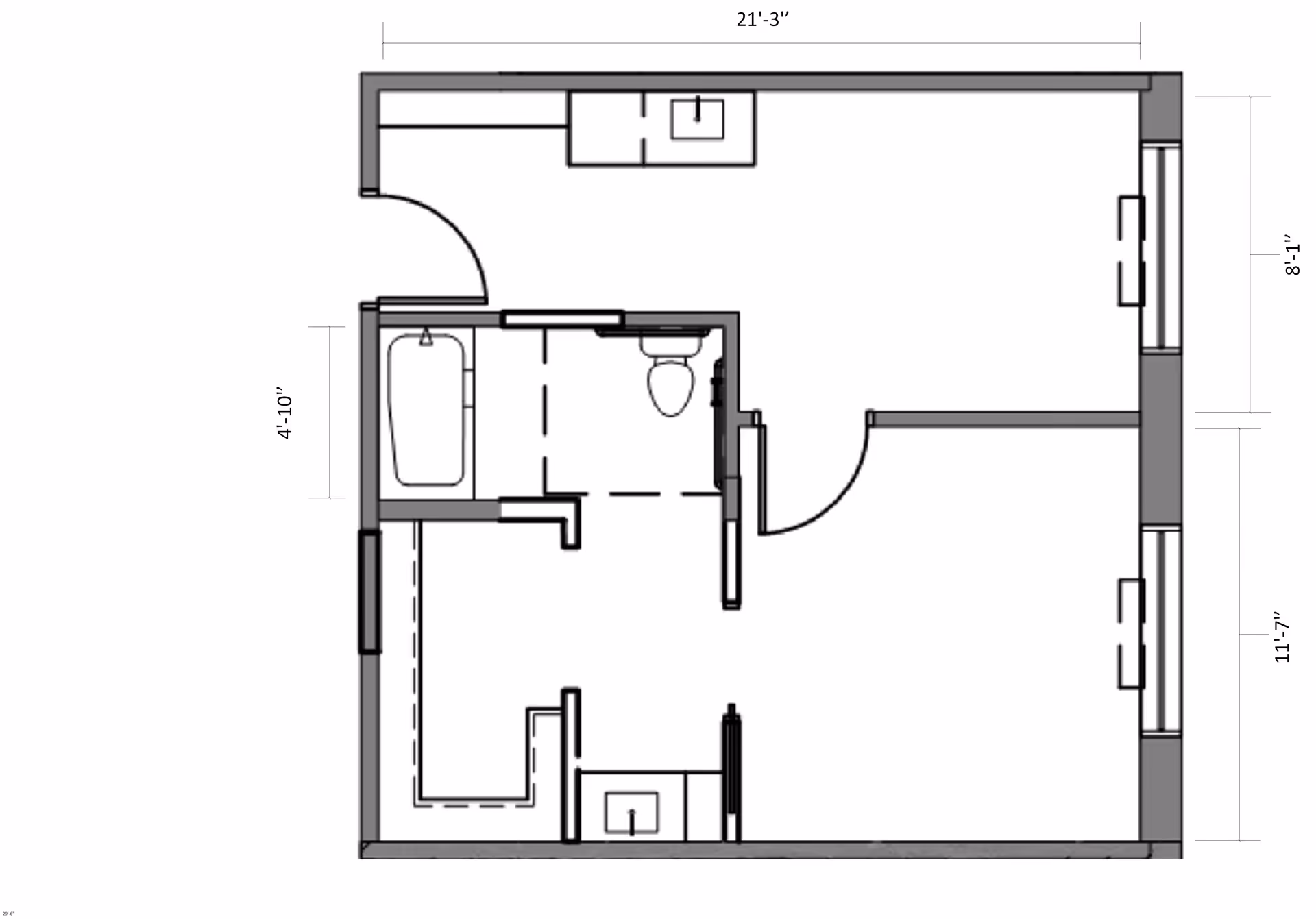 Architectural floor plan of a small apartment unit showing a bathroom with a bathtub and toilet, a kitchen area with a sink, and a separate room likely intended as a bedroom or living space. Dimensions are marked along the edges.