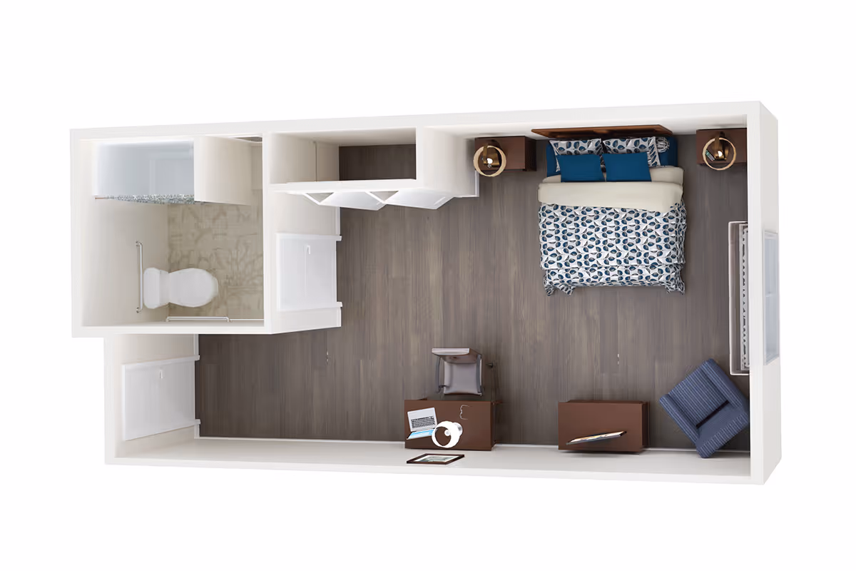 Top-down view of a small studio apartment floor plan featuring a bedroom area with a bed, two nightstands, a chair, a desk with a laptop and chair, a dresser, and a bathroom with a toilet and shower.