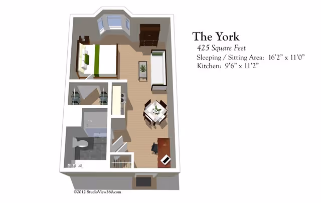3D floor plan of a senior living apartment named The York, showing a 425 square feet layout with a sleeping/sitting area including a bed, sofa, coffee table, dining table with chairs, and a kitchen area. The plan also includes a bathroom and closet space.