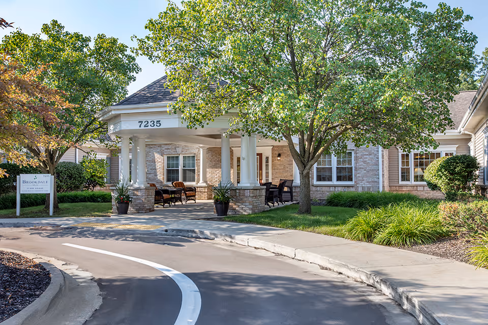 Entrance of a Brookdale Delta senior living facility with a covered front porch.