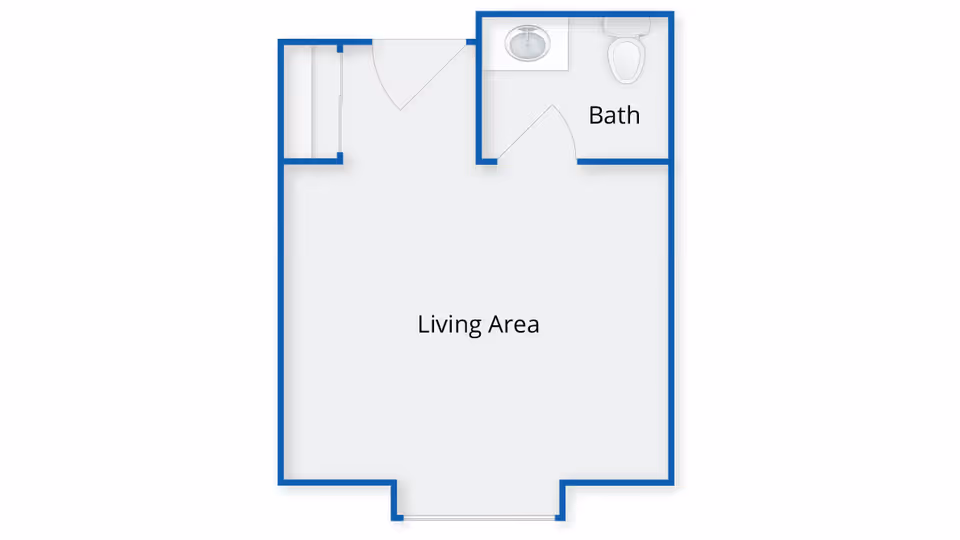 Floor plan of a small living space at The Arbors at Shelburne showing a living area and a separate bathroom with a sink and toilet.