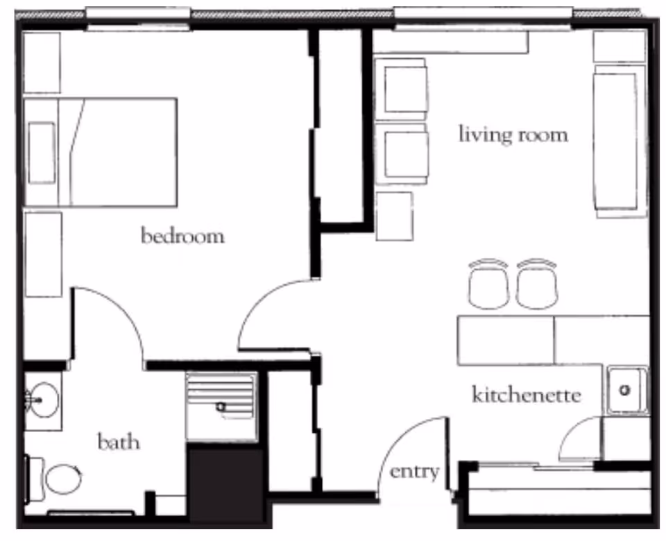 Floor plan of a senior living unit at Celebration Villa of Summit Hills showing a bedroom with a bed and two side tables, a bathroom with a toilet and sink, a living room with seating furniture, and a kitchenette with a counter and two stools, along with an entry area.