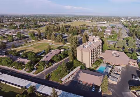 Aerial view of Health Center at Rosewood campus showing multiple buildings, greenery, and a pool.