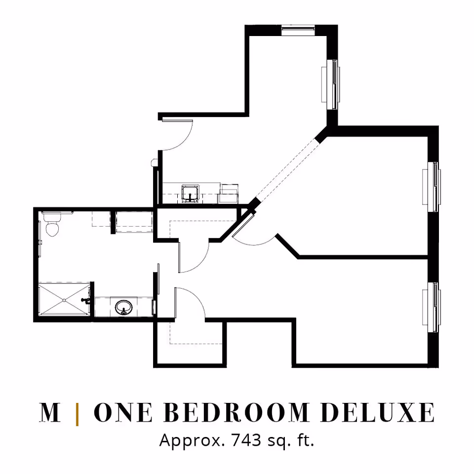 Black-and-white floor plan labeled 'One Bedroom Deluxe' showing the layout of a one-bedroom apartment with a bathroom, kitchen area and living spaces, approx. 743 sq. ft.