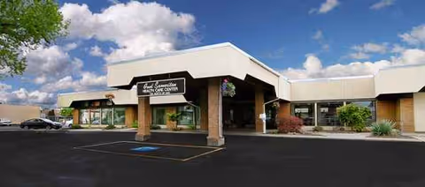 Exterior view of Good Samaritan Health Care Center with a covered entry and parking.