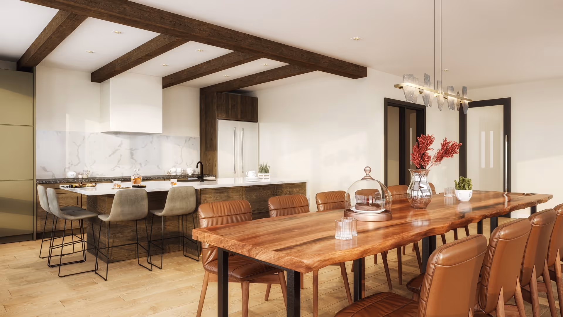 A modern kitchen and dining area featuring a wooden dining table with brown leather chairs, a kitchen island with gray bar stools, wooden ceiling beams, and a contemporary light fixture above the table. The kitchen has a marble backsplash, a double-door refrigerator, and a white range hood.