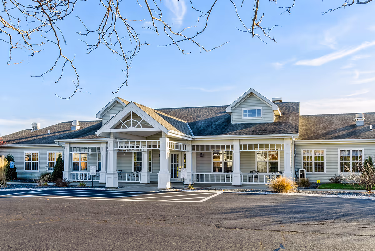 Exterior view of Trustwell Living at Oakley Place, front entrance with porch.