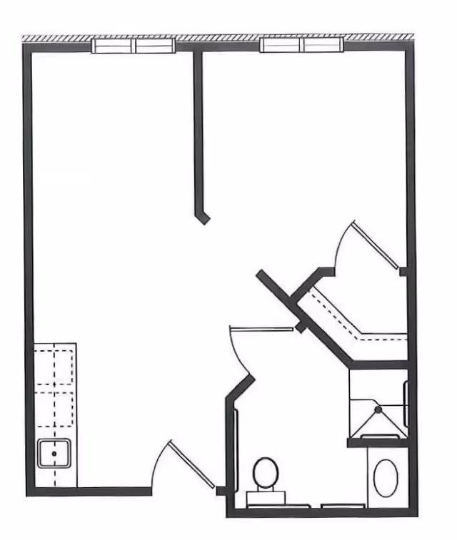 Black and white architectural floor plan of a small apartment or unit showing a kitchen area with a sink, a bathroom with a toilet, shower, and bathtub, and an open living space with two windows.